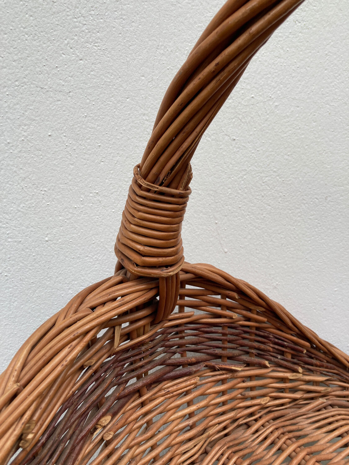 Large old woven wicker log basket