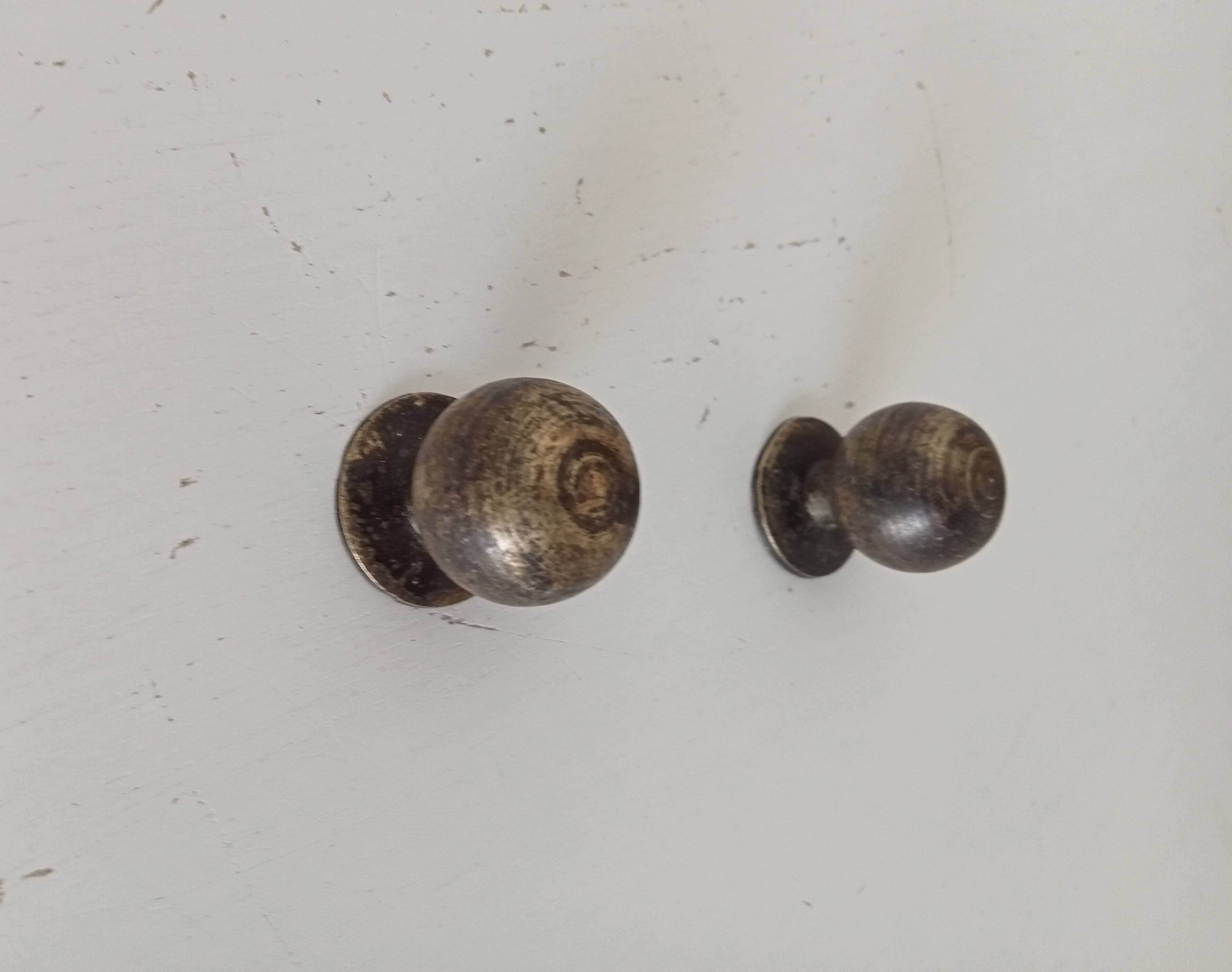 Pair of antique bronze furniture handles.