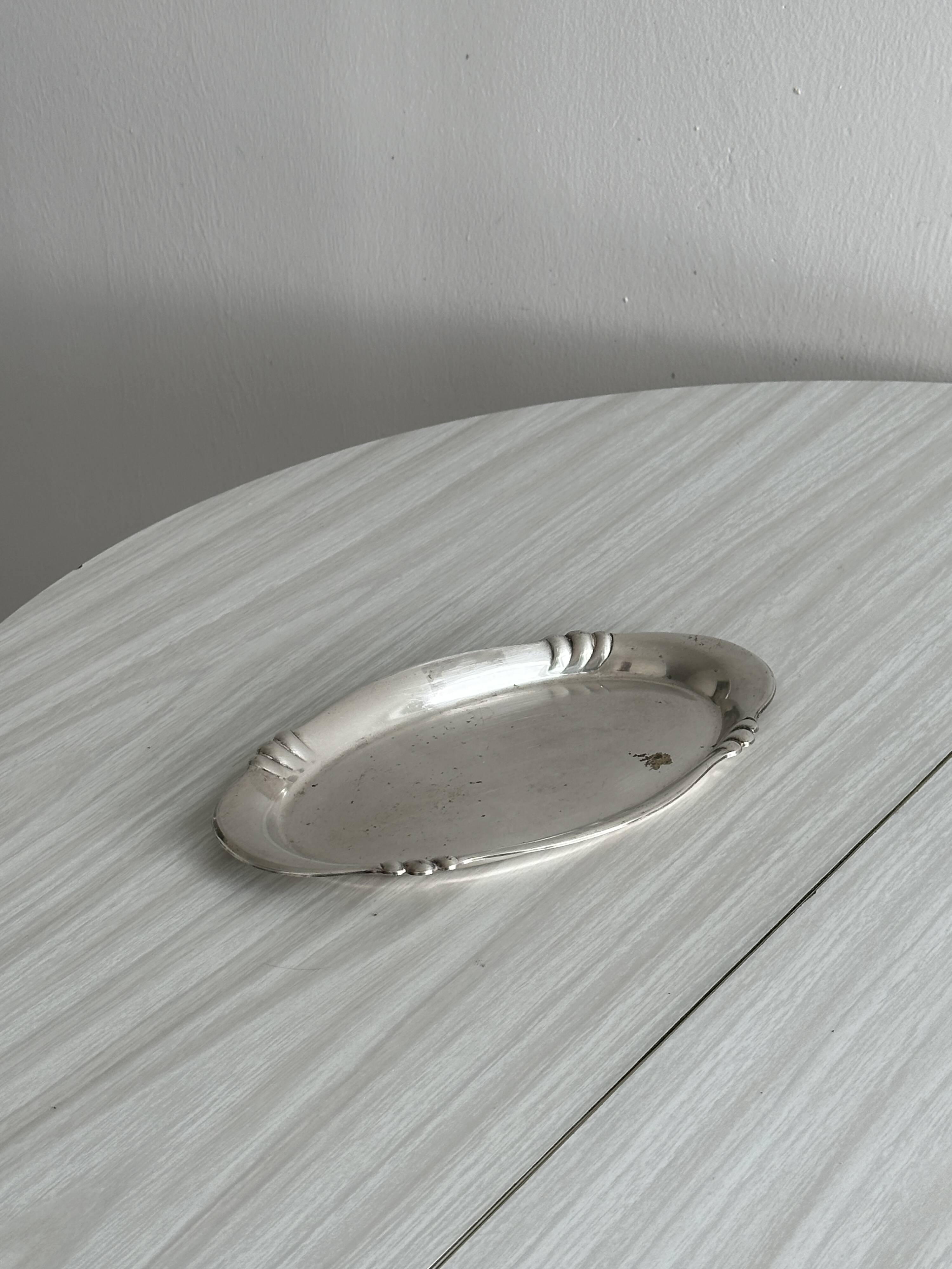 Small vintage tray in silver-plated light metal