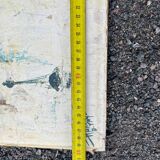 Animated view of a table with sailboats, signed.