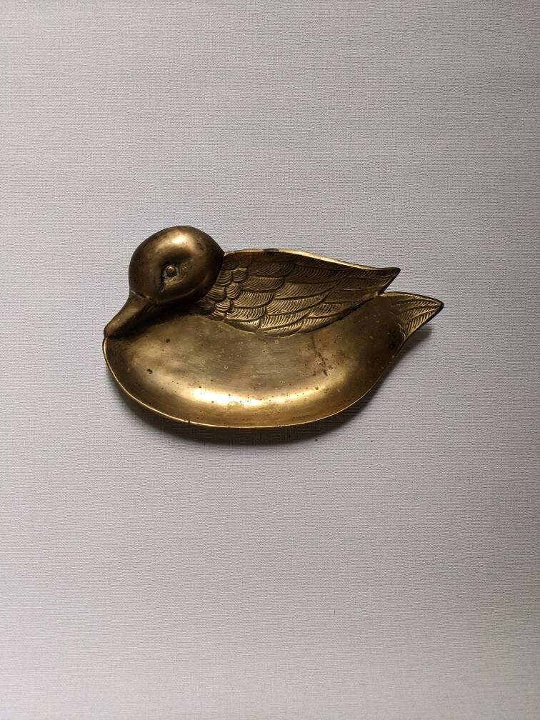 Brass duck emptier, country decorative object