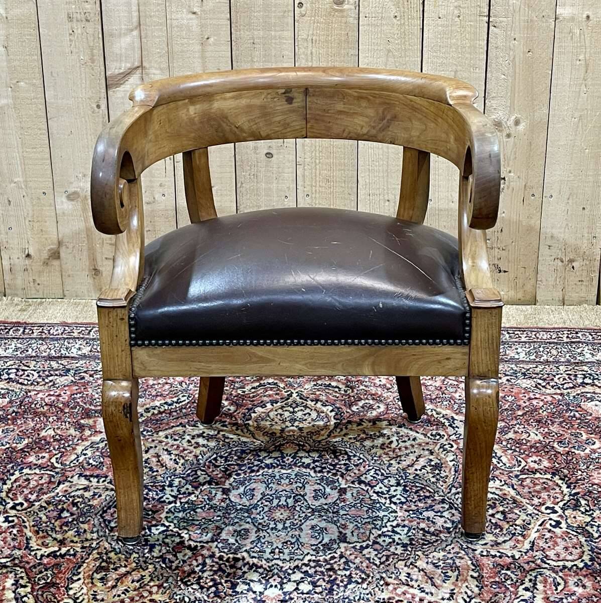 19th century French armchair in cherry wood and leather seat