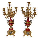 Pair of six-light candelabra in patinated and gilded bronze and spelter.