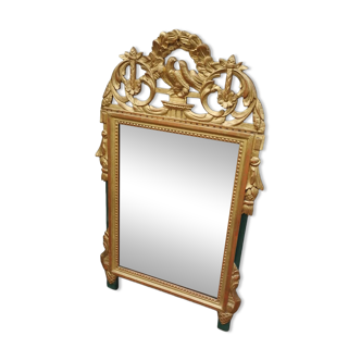 Antique gilded wooden mirror in Louis XVI style