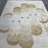 Large rug with flower decoration.
