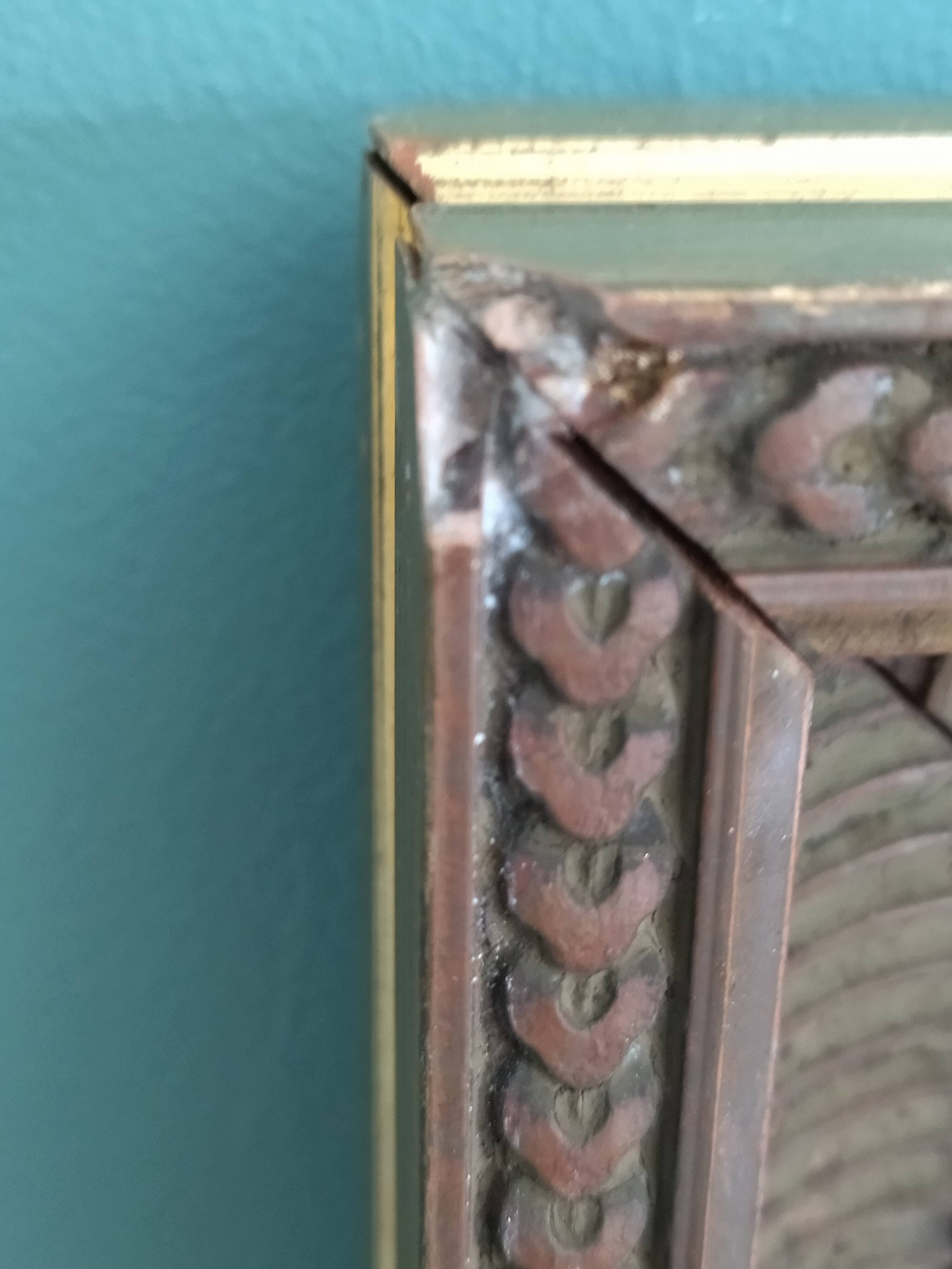 Pair of frames in old carved wood