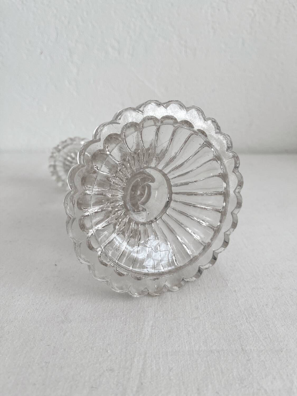 Antique baluster-shaped molded glass candlestick holder