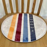 Solid wood swivel and reclining armchair.