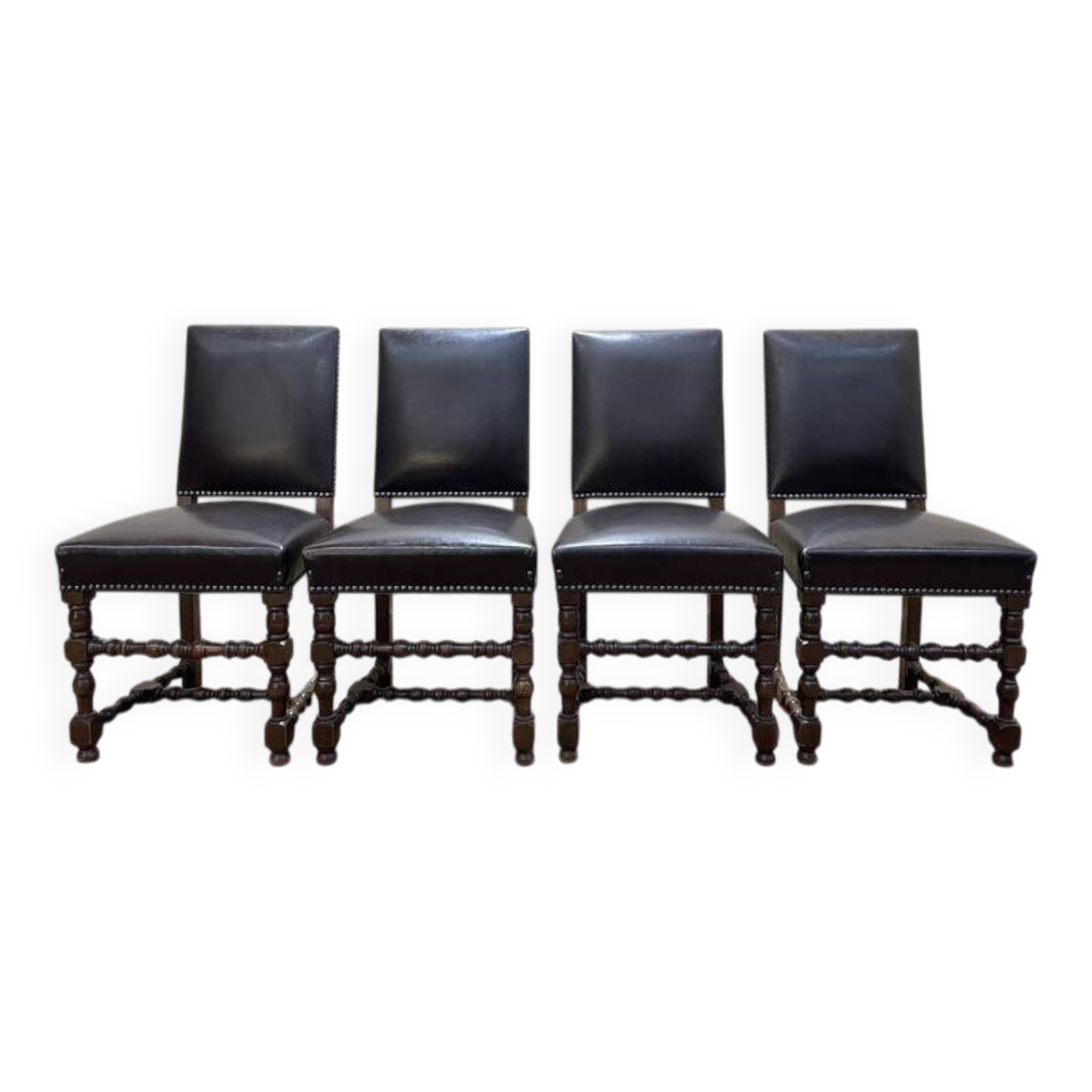 Suite de 4 chaises de style Louis XIII en cuir