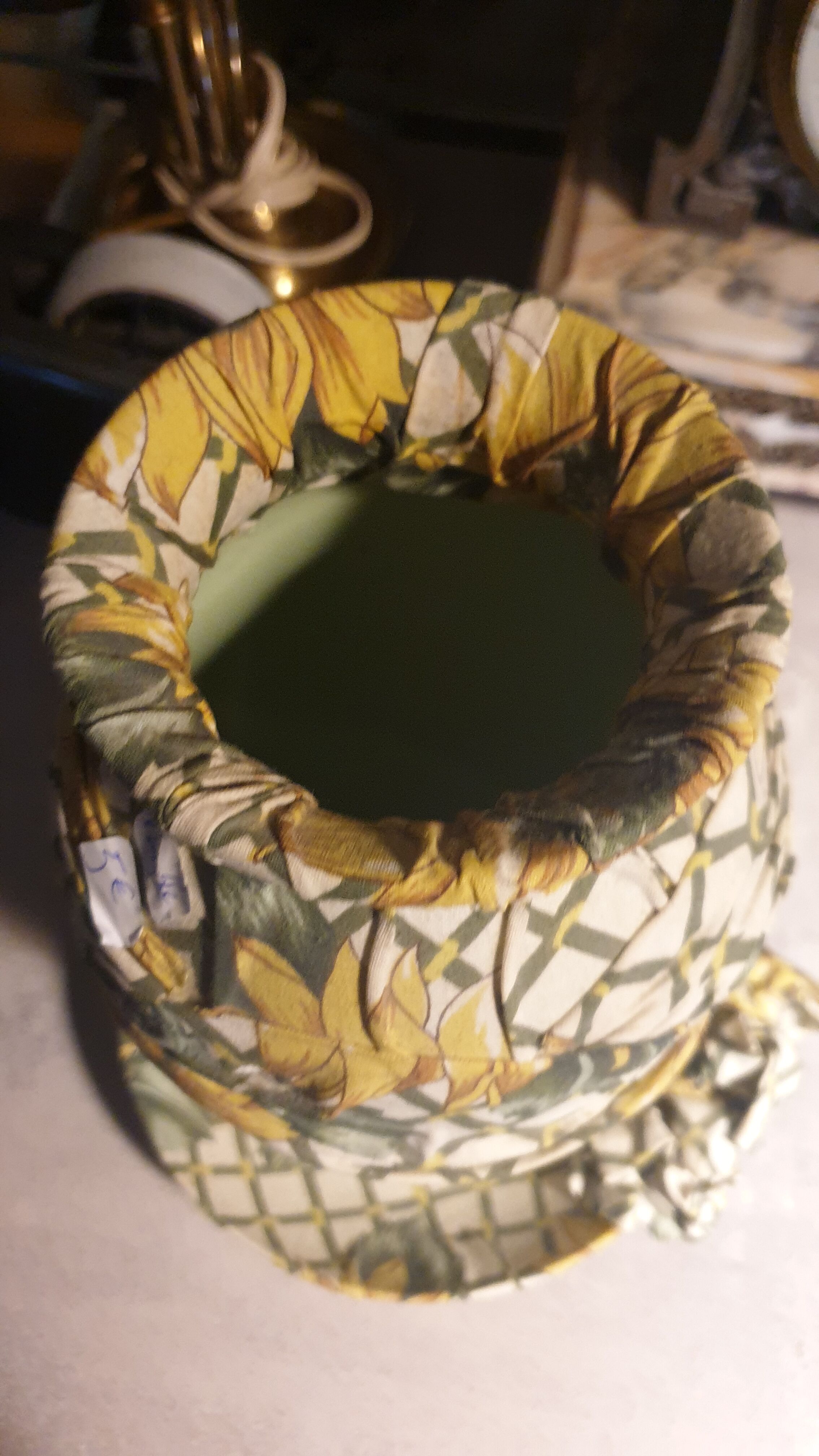 Vase and ceramic cup in fabrics