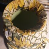 Vase and ceramic cup in fabrics