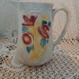 Antique earthenware pitcher