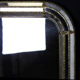 Faceted mirror and gold brass pare closes