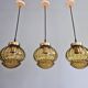 Set of 3 amber glass pendant lights, RAAK Amsterdam, 1970
