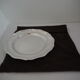 Round plate, Chinon collection with gold trim, Christofle, and its protective felt pouch.