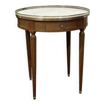Louis XVI style bouillotte table from the 1960s in mahogany with a marble top.