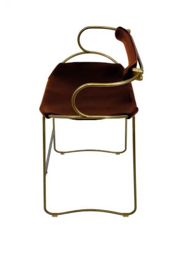 Contemporary sculptural bar stool with a metal back in aged brass and cognac leather.