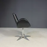Alipes black swivel salon chair with chrome star base by Giorgetto Giugiaro for Gamma & Bross, Italy, contemporary, 85 × 70 × 60 cm