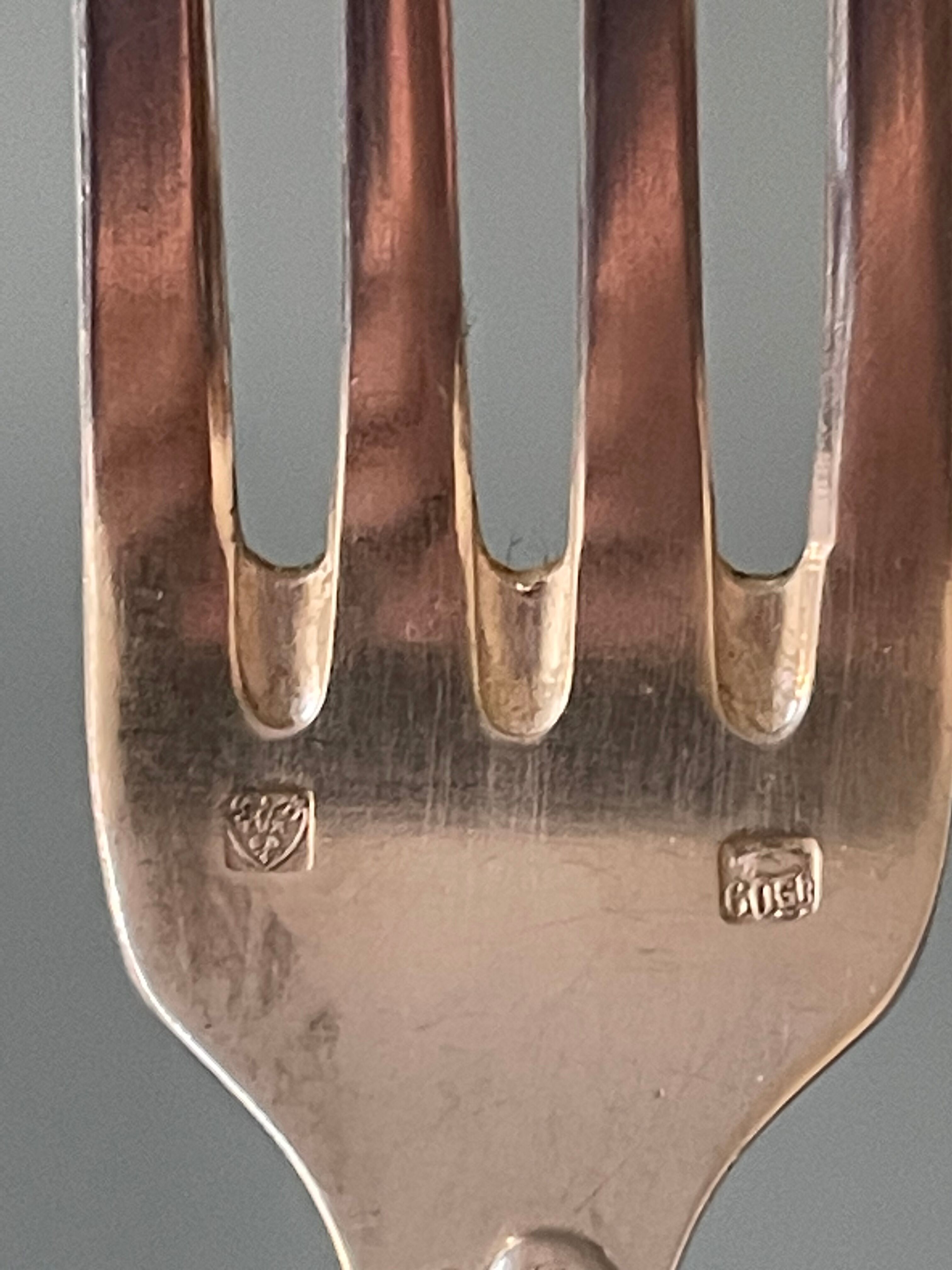 Series of 21 antique silver metal table forks