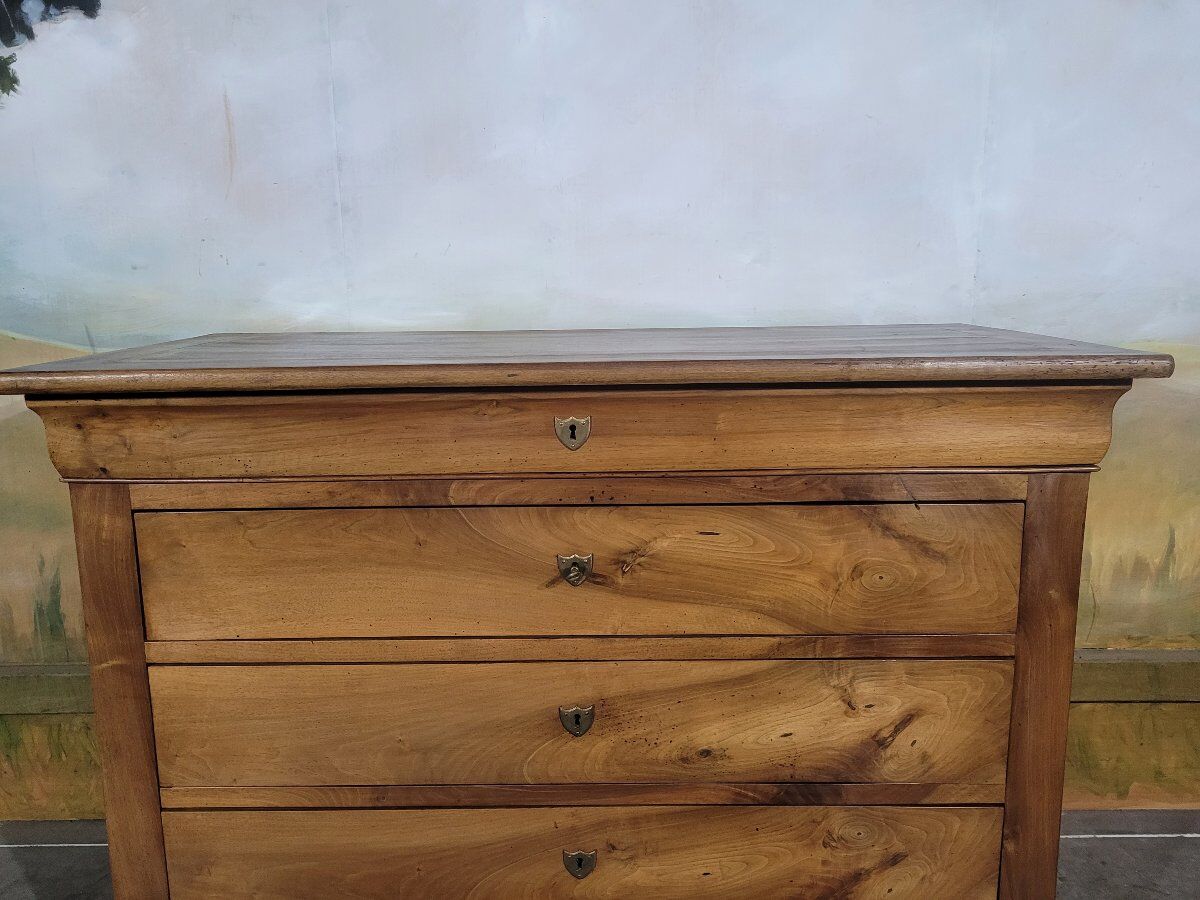 Louis Philippe period chest of drawers in solid walnut.