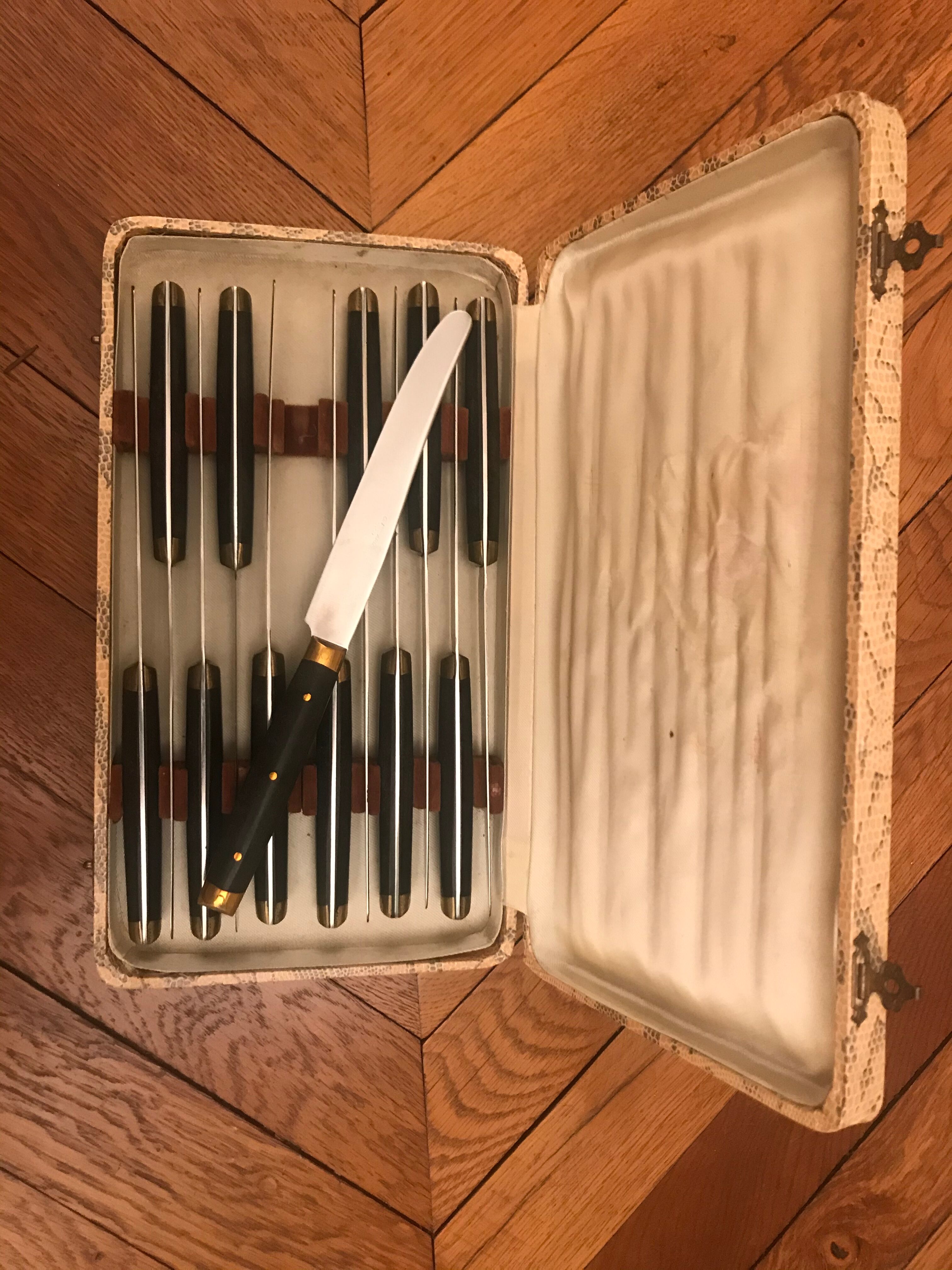 Twelve Ebony Bakelite Knives
