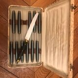 Twelve Ebony Bakelite Knives