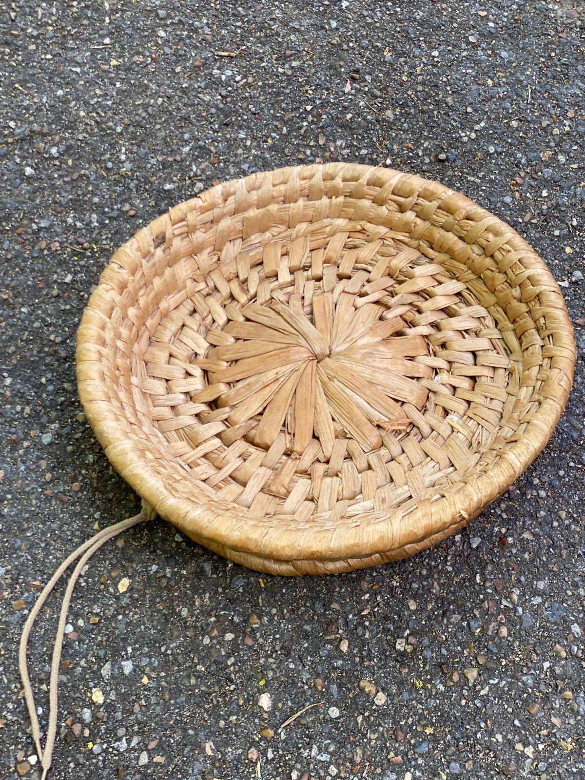 Round basket woven from banana fibre.