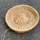 Round basket woven from banana fibre.