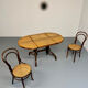 Vintage dining table with a cane top by Mundus from the 1970s.