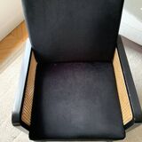 Fauteuil en velours noir et cannage