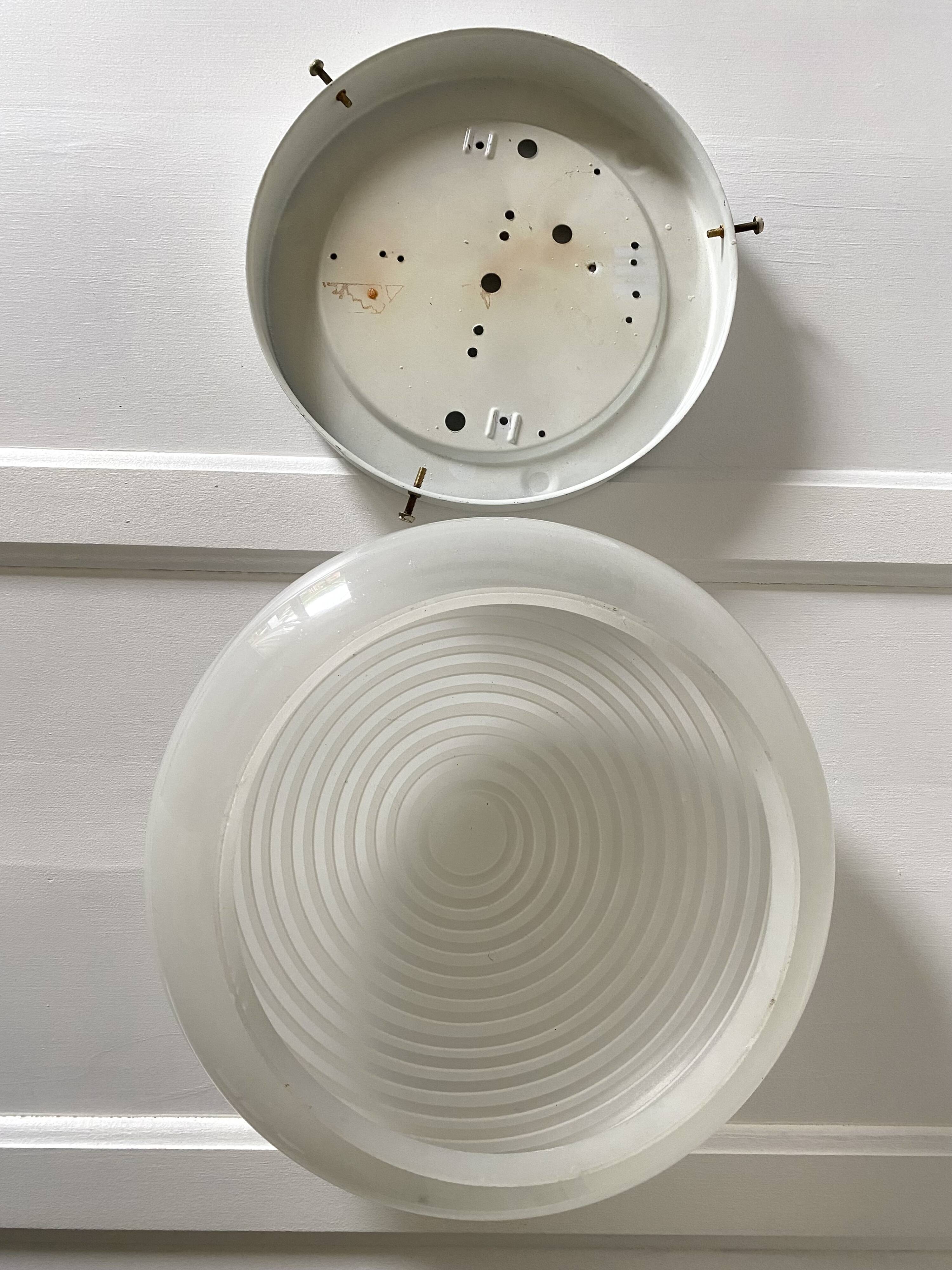 Round curved spiral ceiling light space age