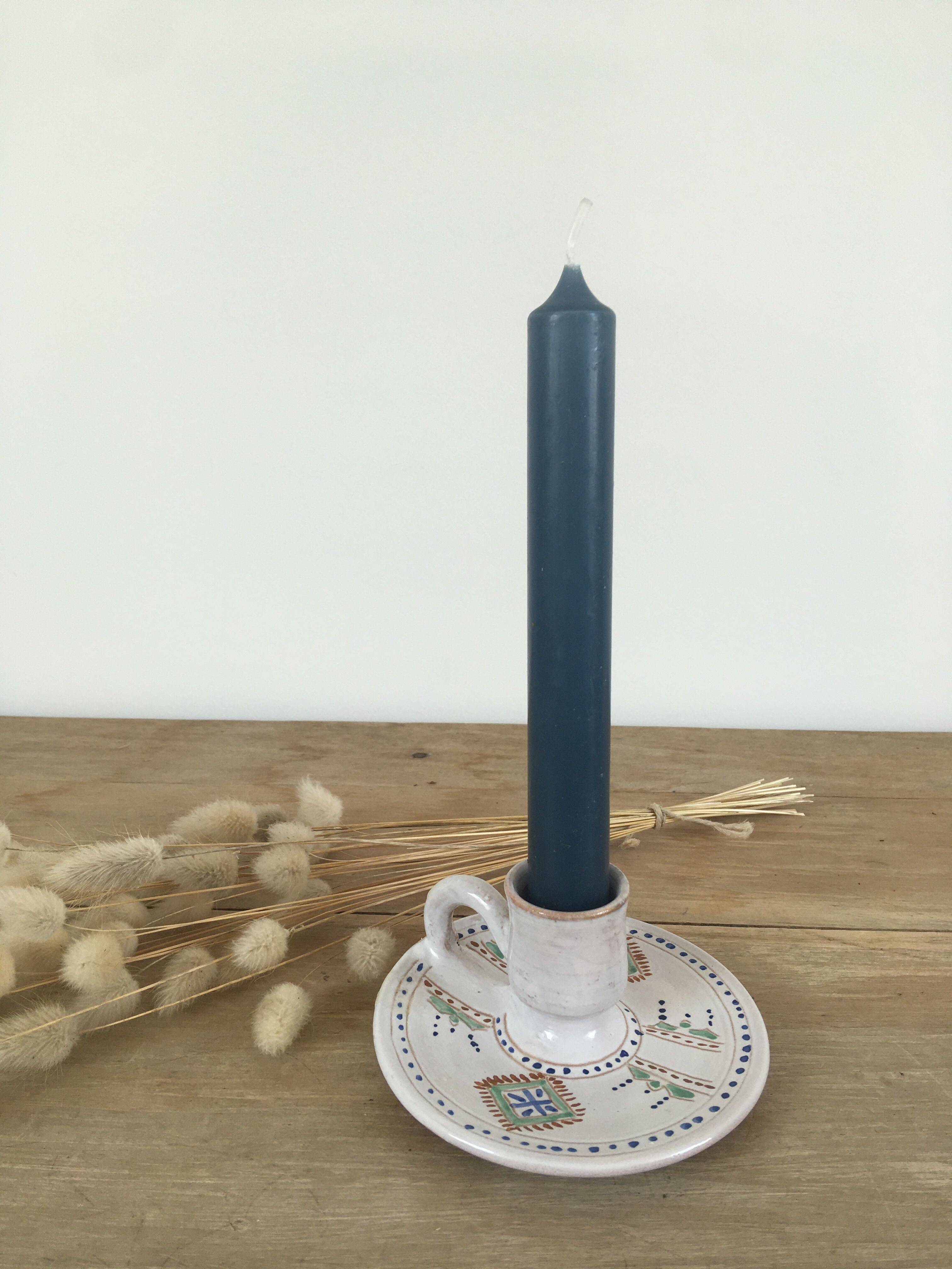 Green ceramic cellar rat candle holder