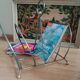 Vintage magazine rack with brass legs
