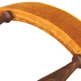 Mustard gondola armchair in the style of Helmut.