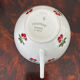 Magnificent teapot and fine porcelain cup set by Pillivuyt with cherries.