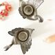 Duo candle holders in metal swan pattern