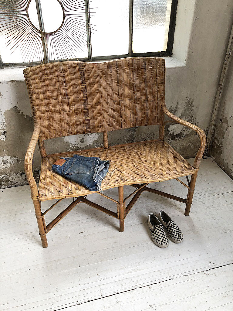Old wicker and rattan bench