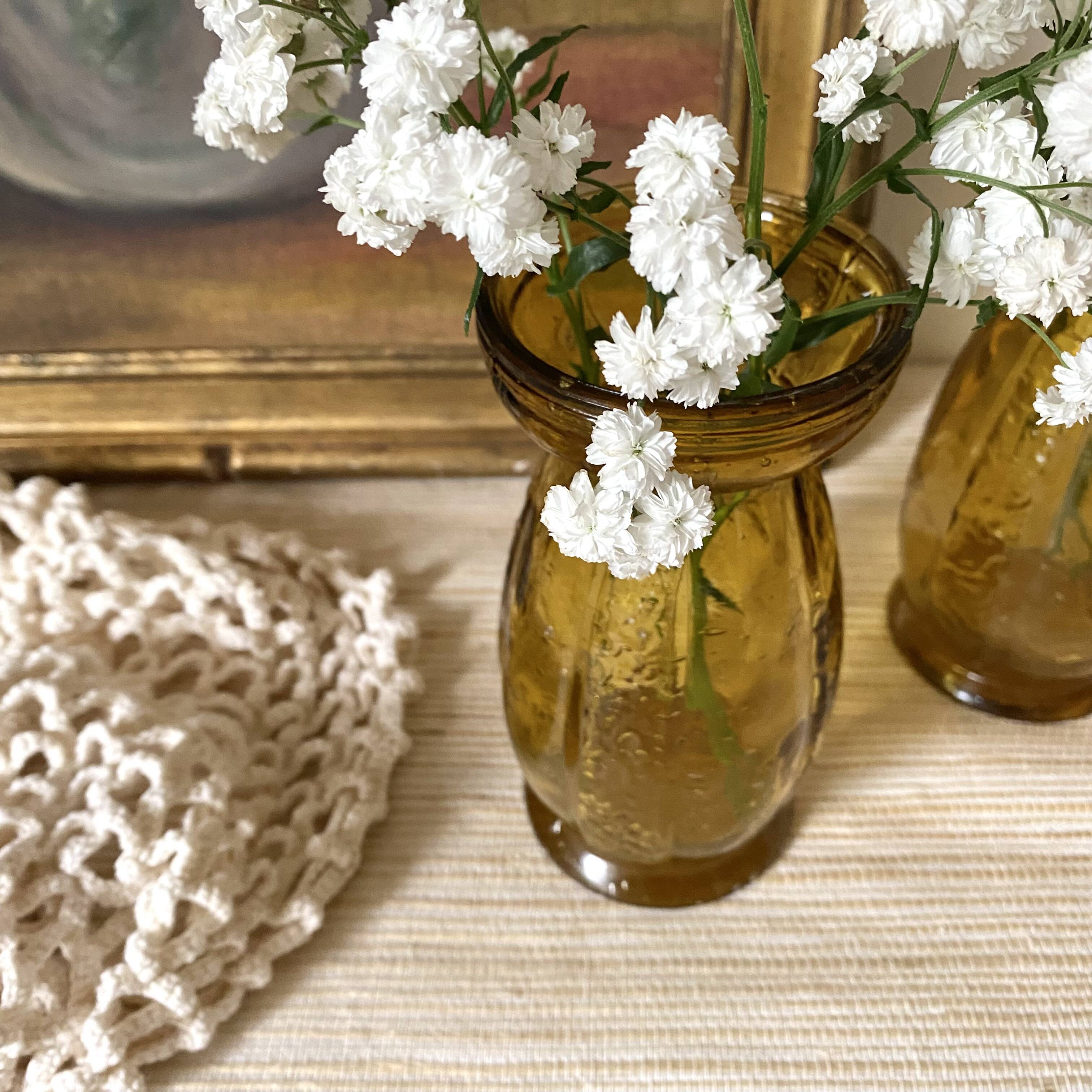 Paire de vases à jacinthe en verre ambré bullé