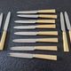 Philos - Set of 12 stainless steel dessert knives with bakelite handles.