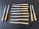Philos - Set of 12 stainless steel dessert knives with bakelite handles.