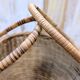 Panier boule en rotin tressé à anse