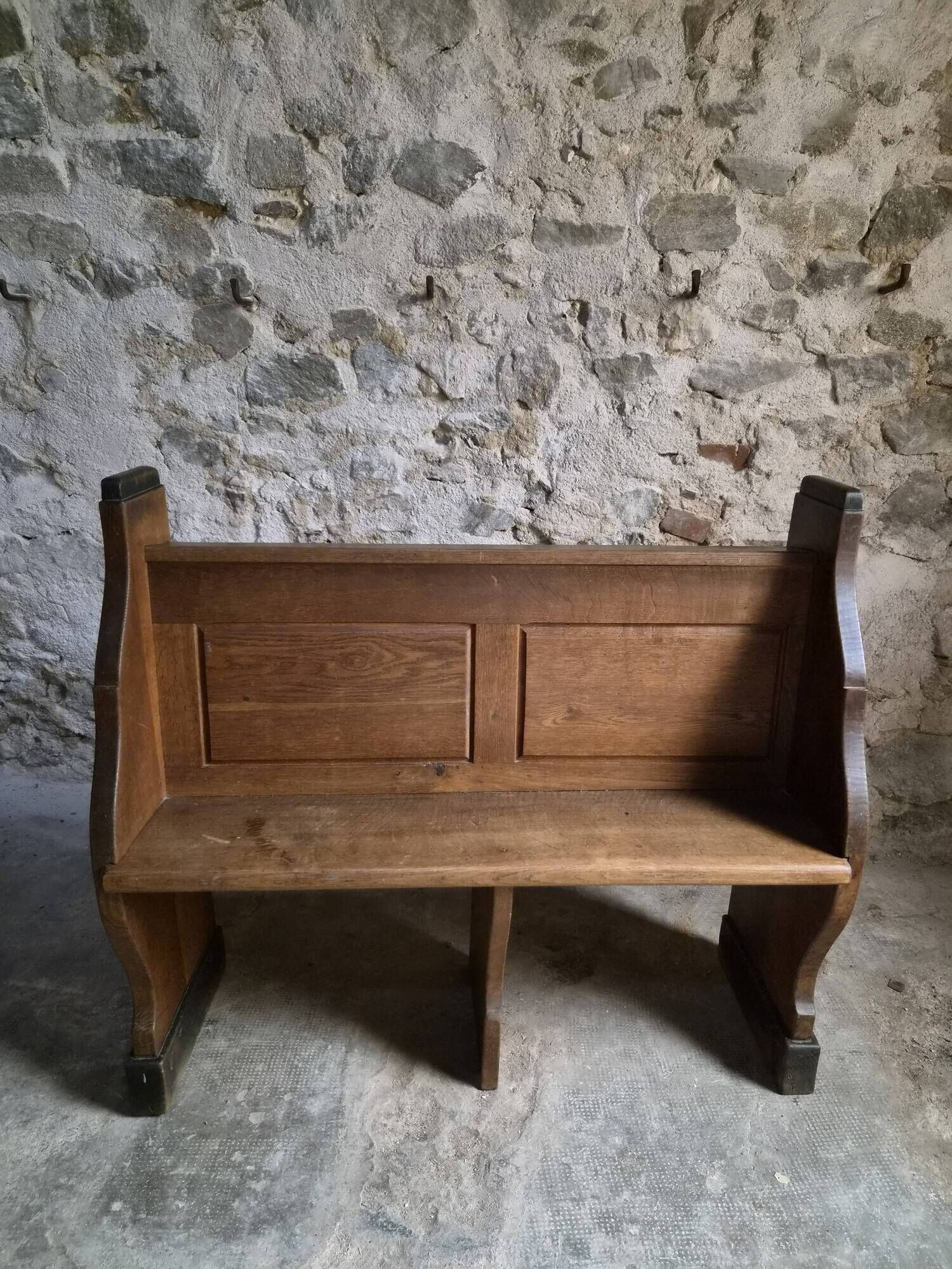 Antique church bench in oak, circa 1900–1920
