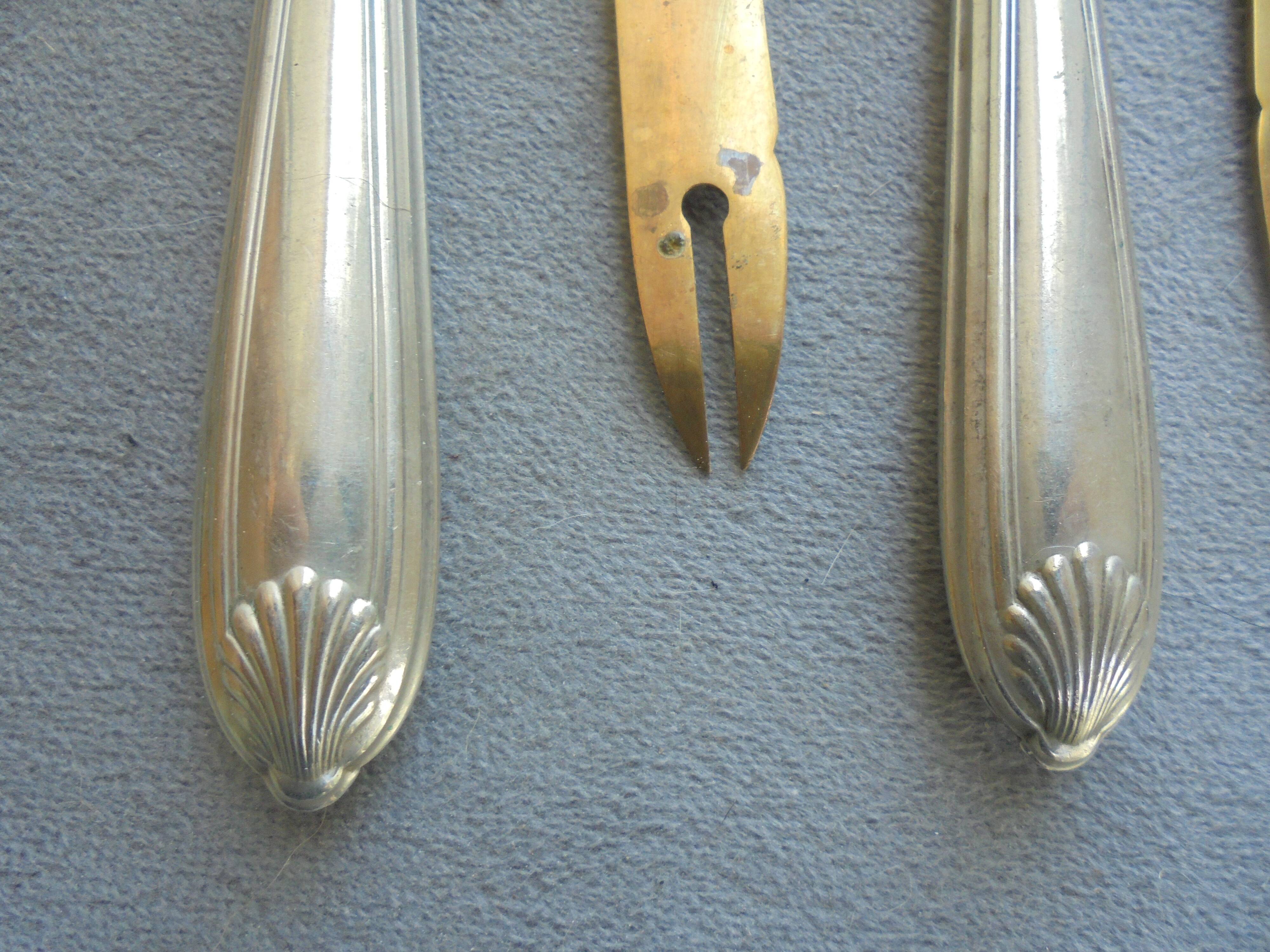 12 Antique Silver-Plated Melon Knives