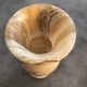 Vintage vase in marbled onyx stone shades of beige and brown