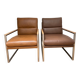 A pair genuine leather armchairs.
