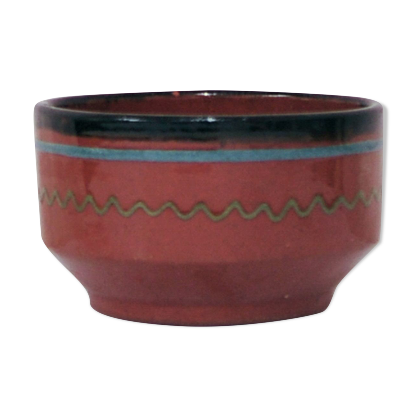 Brown bowl with a green and blue design