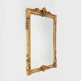 Miroir mural en bois sculpté et doré, très décoré, Belgique vers 1950