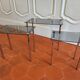 3 nesting tables from the 1970s in smoked glass.