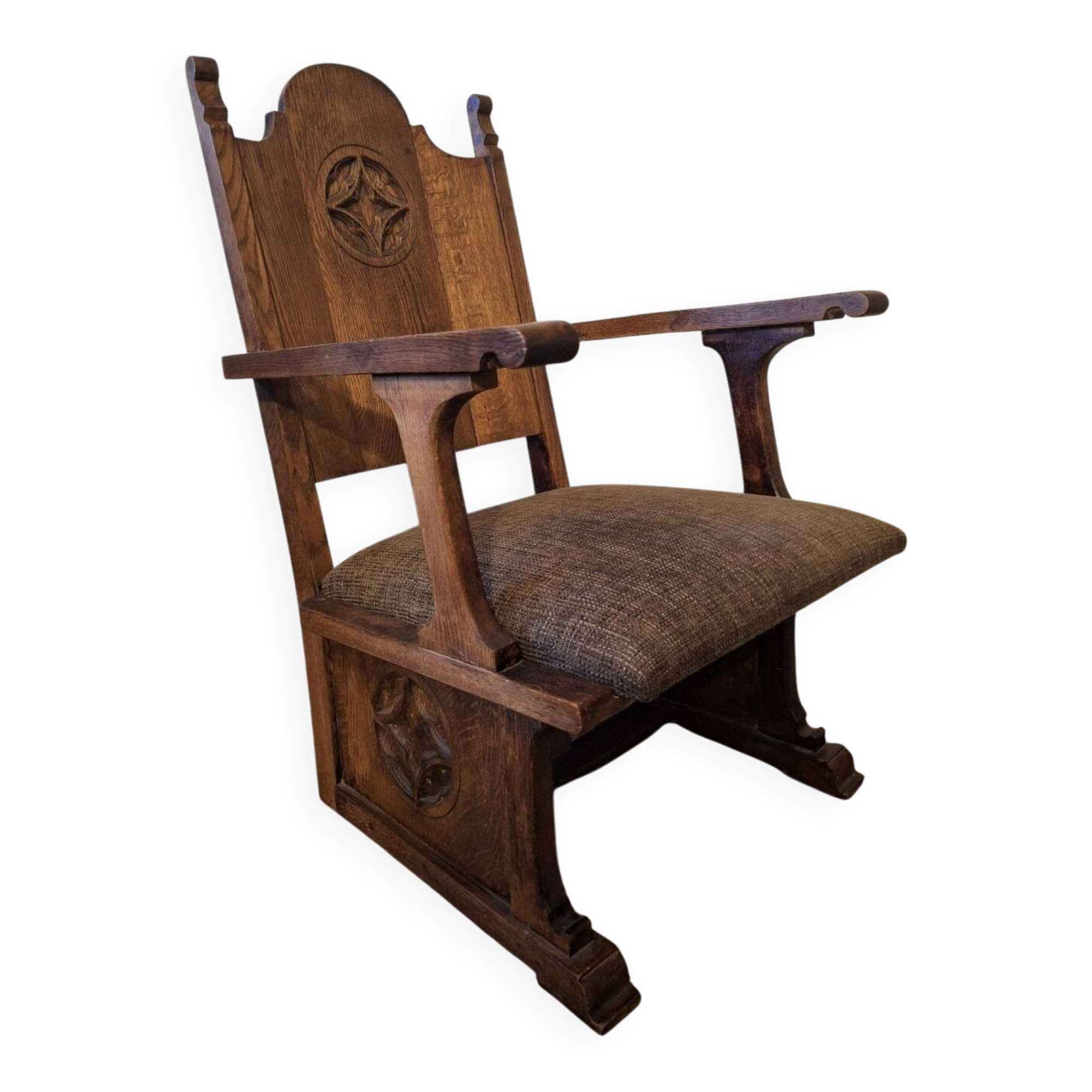 Antique Gothic Revival carved oak armchair, 1910