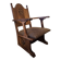 Antique Gothic Revival carved oak armchair, 1910